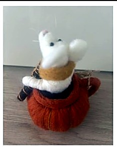 White mouse in a mustard scarf