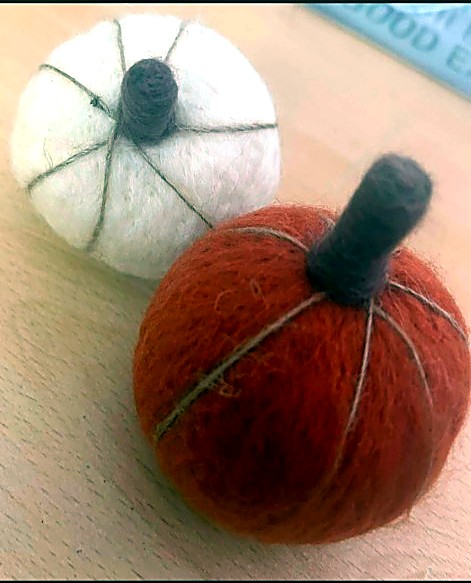 Pair of felt pumpkins