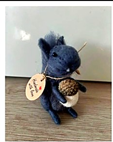 Felt squirrel with acorn
