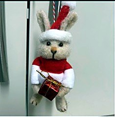 Felt bunny in a Santa hat